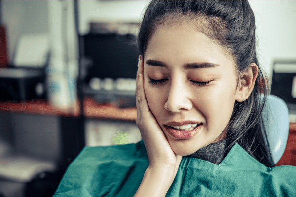 Understanding Tooth Sensitivity: Causes and Remedies